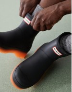 Play short boots with translucent sole in black