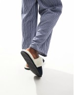 mule slippers in navy suede with faux shearling lining