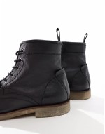 lace up boots in black leather with natural sole